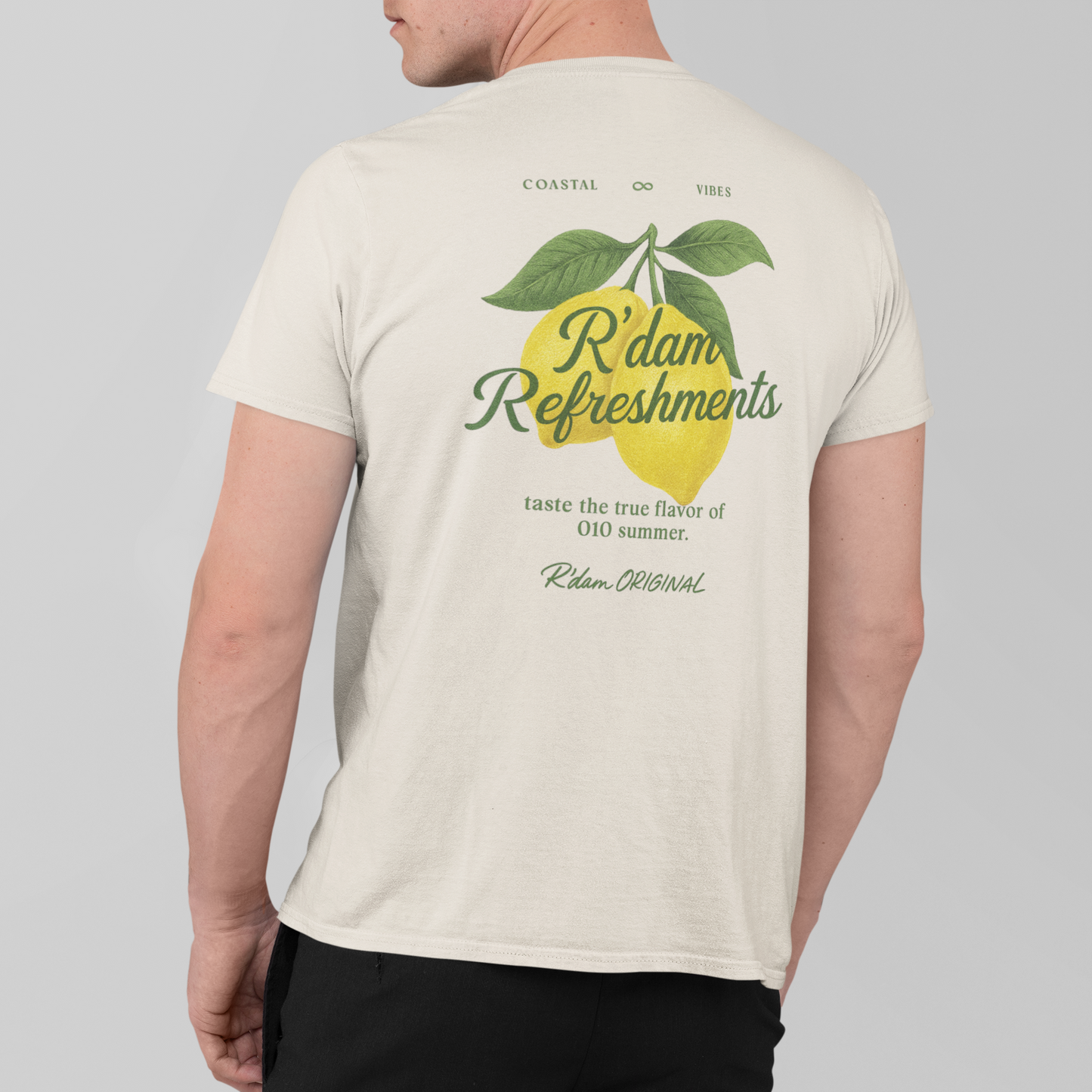 Crèmekleurig shirt met lemon print, coastal vibes & R’dam Original tekst – achterkant