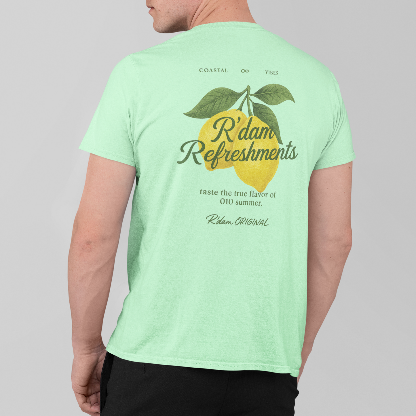 Mintgroen T-shirt met citroenprint en “R’dam Refreshments” tekst