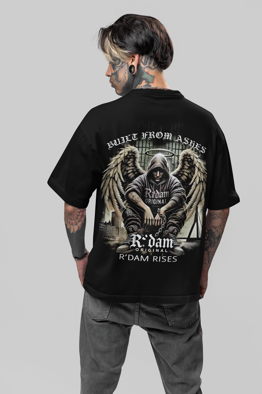 Built from Ashes" oversized heren T-shirt van R’dam Original. Heavyweight katoen, urban streetwear met engel-design en krachtige boodschap.