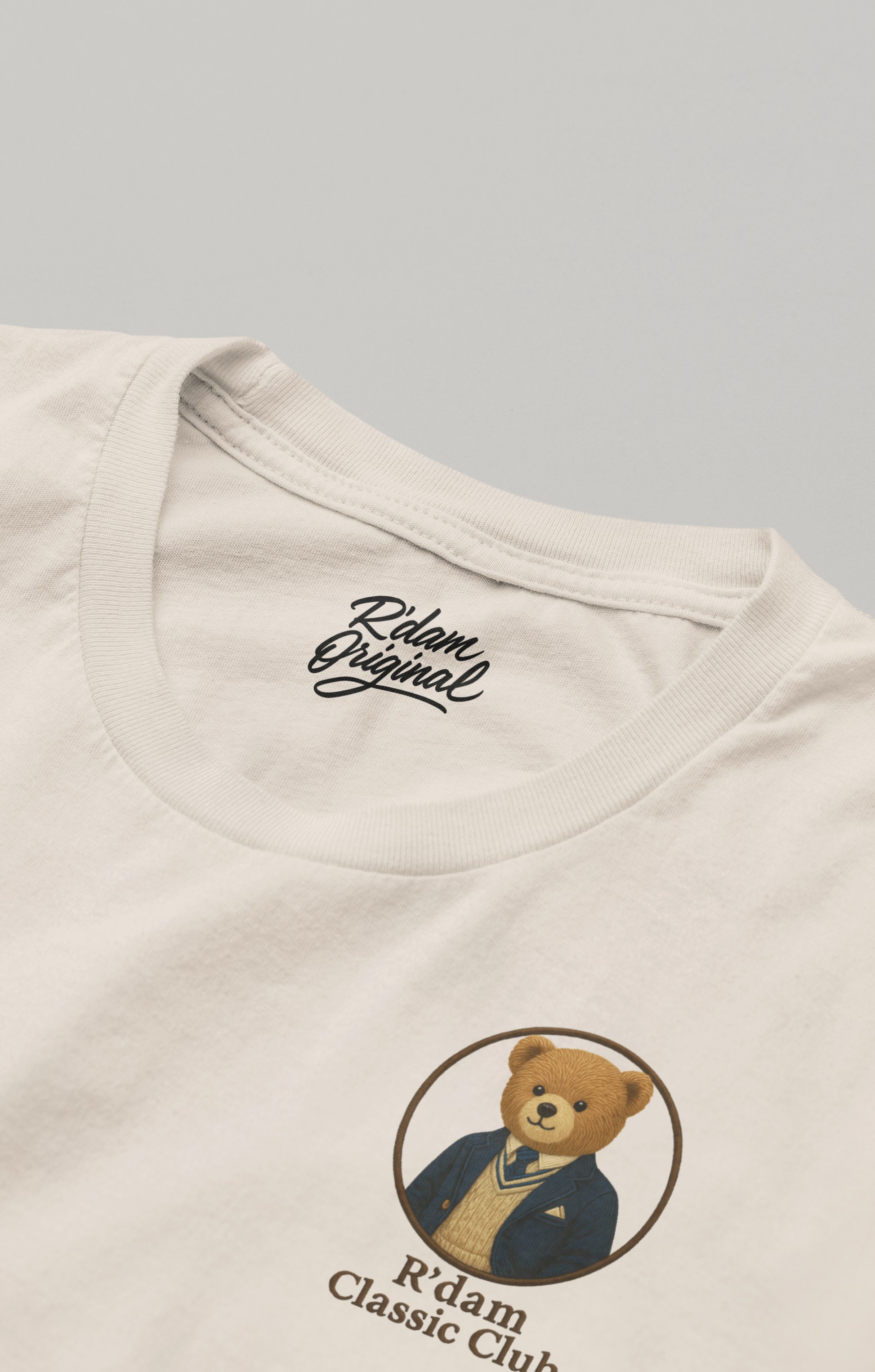 Close-up borstprint R’dam Original Classic Club sand kleur